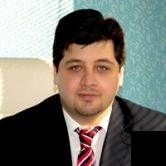 تلفن و آدرس دکتر علی قارونی در تهران (گوش، حلق و بینی)