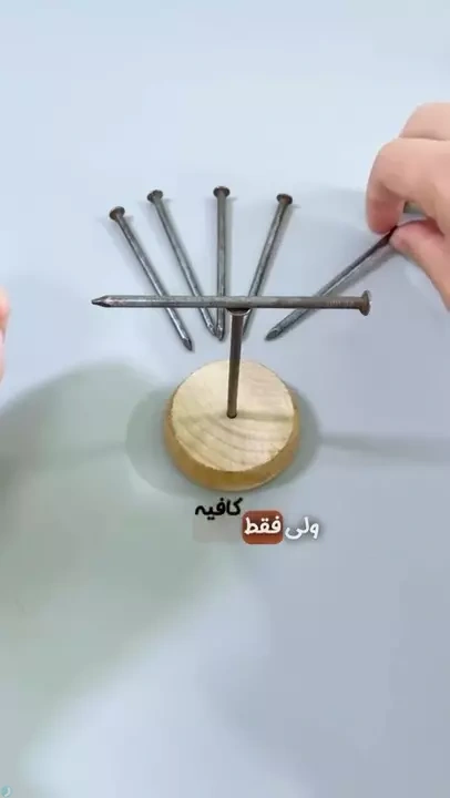 میتونی شش تا میخ رو روی یه میخ سوار کنی؟